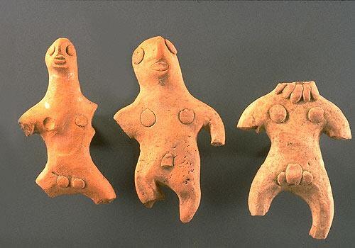 Male figurines may be distinguished by genitalia and/or small flat nipples. A few male figurines wear chokers with pendants very similar to those worn by females. Some males are depicted with bowed legs. Approximate dimensions (W x H x D) of the largest figurine: 5.3 x 9.0 x 1.5 cm.