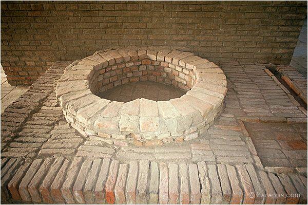 This unique well and associated bathing platform was discovered in the course of building a catchment drain around the site. It was reconstructed on the ground floor of Mohenjo-daro site museum.