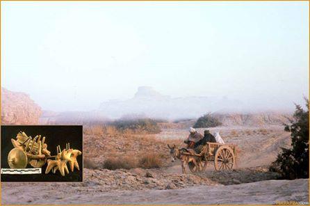 Early morning mist at Mohenjo-daro with the Buddhist stupa perched on top of the "citadel" mound. 