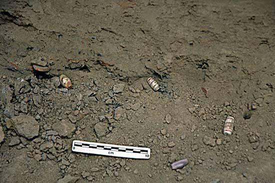 In the street levels above the drain a collection of banded sandstone and banded terracotta beads were discovered.