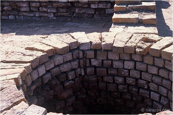 Wells were made with wedge shaped bricks to make a strong circular structure. Some bricks were made with special grooves to keep the ropes from sliding sideways when drawing water.