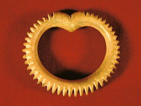 Faience bangle made in the shape of a shell bangle or the stylized "womb" motif, Harappa.