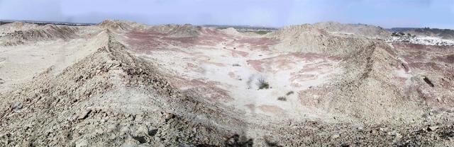 Panoramic view of the site looking towards north-west. The citadel area is enclosed by the eastern and western fortified walls which converge towards the entrance ‘gateway’ in the south-west.