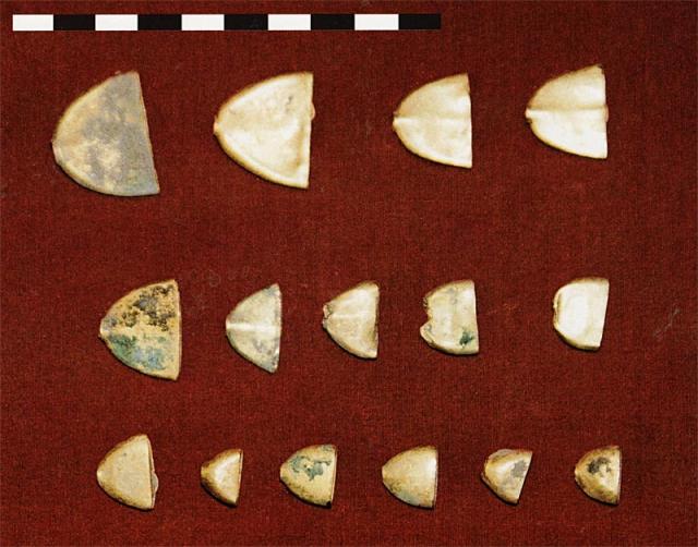4. Hollow terminal beads, gold.