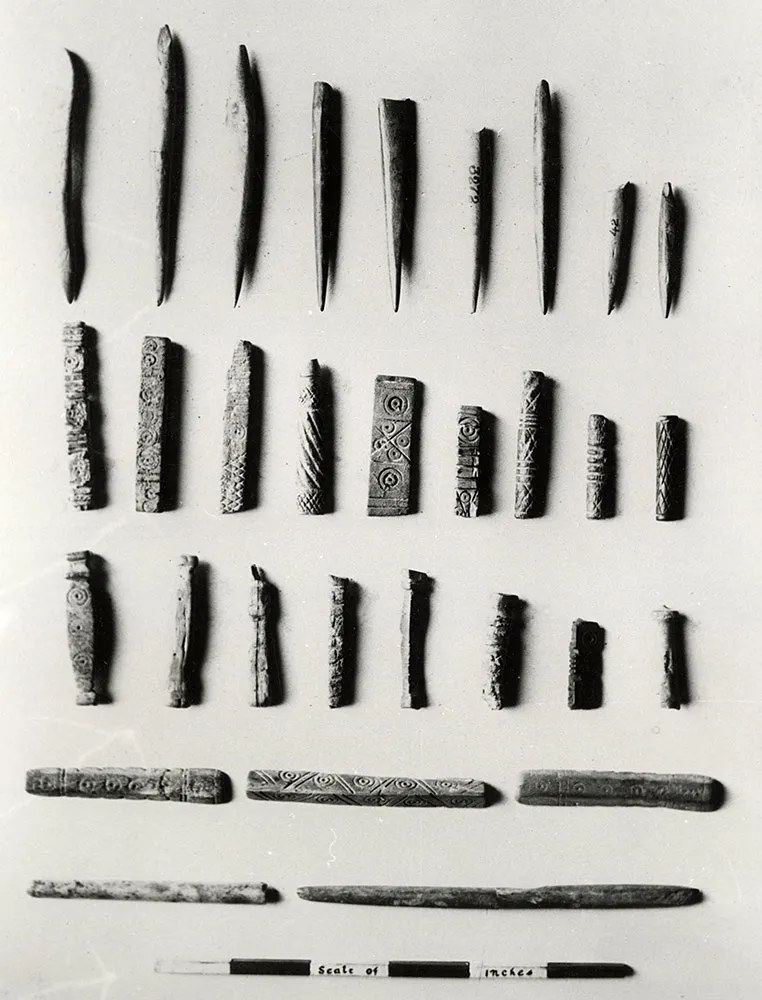 Cubical chert weights and ivory objects.
