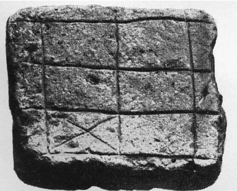 Brick with scratched grid of rectangles