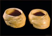 Two magnificent wide shell bangles, each made from a single conch shell (Turbinella pyrum) found at Harappa.
