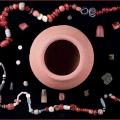 Faience beads of different shapes and colors were found in the bead pot. Some of these appear to be imitations of the natural stones; deep azure blue lapis lazuli, blue-green turquoise and banded to imitate banded agate.