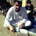 Mullah Ashur grinding beads
