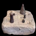 Possible burnt brick gameboard from Mohenjo-daro